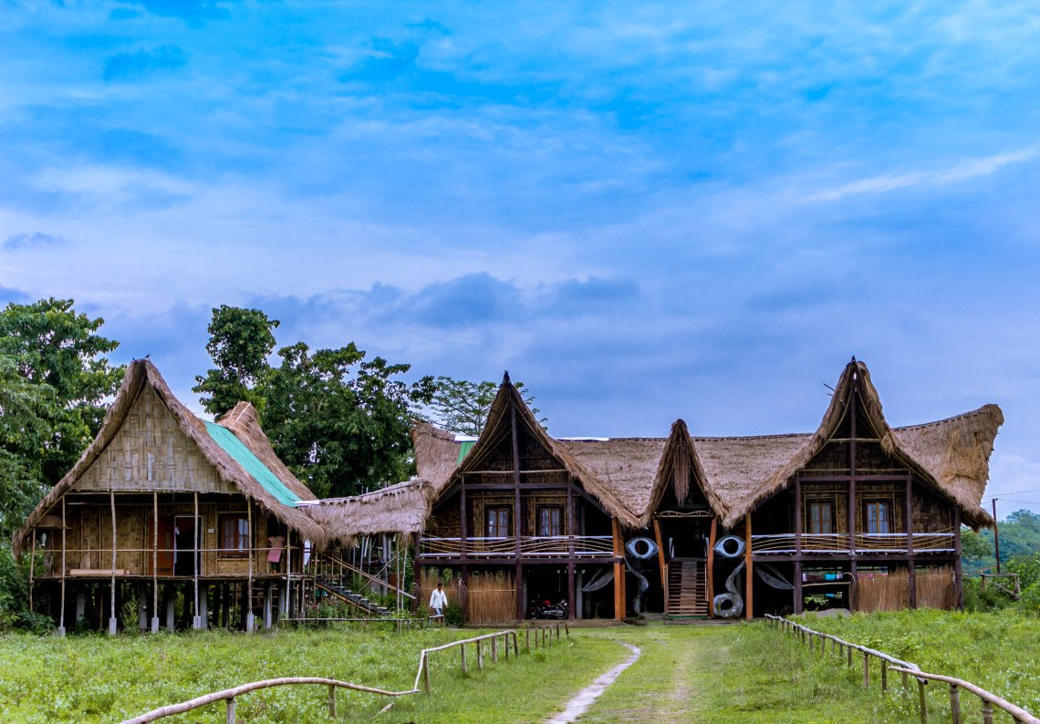 Cottage houses lined up in Majuli, Assam